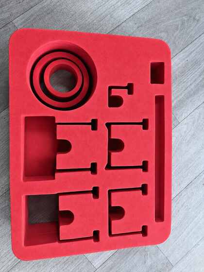 Red EVA foam insert layout for a custom lighting equipment case